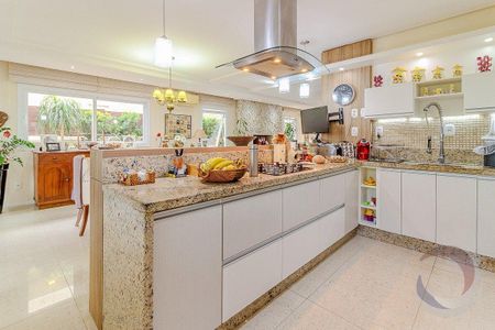 23_photo/95273b04c5.e1d2c46bde3eb79c-ATLAS-f29f0080-b42d-4abc-b599-c775c857bdc1.jpg de casa à venda com 5 quartos, 313m² em Autódromo, Florianópolis