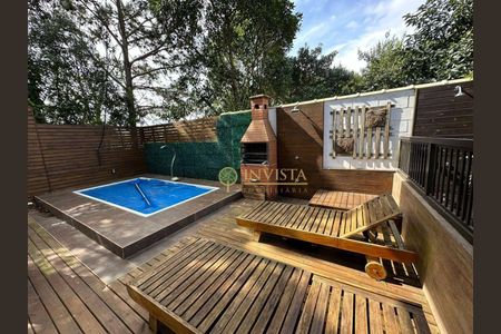 10_photo/95273b6f57.0b41dd9f8e6ad8d9-ATLAS-6d9f6f0b-9e4d-4f3f-a411-a9393fc96df0.jpg de casa de condomínio à venda com 3 quartos, 300m² em Campeche, Florianópolis