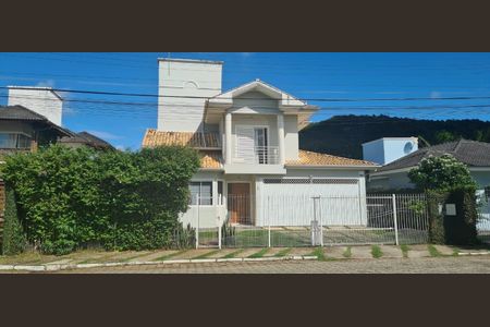 2_photo/95273b78bf.94e84ceda0006bd6-ATLAS-25d4ab88-6cb9-4272-a217-b33bbed48029.jpg de casa à venda com 4 quartos, 246m² em Rio Tavares, Florianópolis