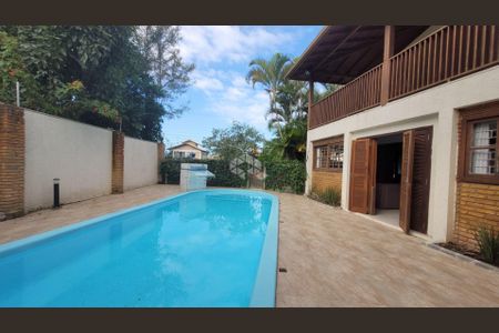 11_photo/95273b798f.aedcea8cc705b638-ATLAS-84c29ded-edfb-4760-b744-fabae6972d9f.jpg de casa à venda com 4 quartos, 203m² em Rio Tavares, Florianópolis