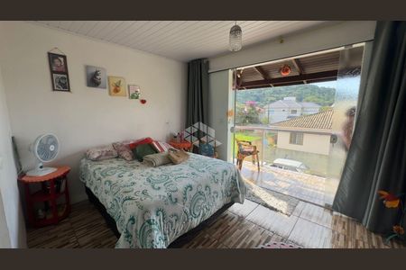 2_photo/95273b8fdf.ceff8192393c33de-ATLAS-65e456f2-5461-4c7f-b1f5-35ea58d0dffd.jpg de casa à venda com 2 quartos, 120m² em Rio Tavares, Florianópolis