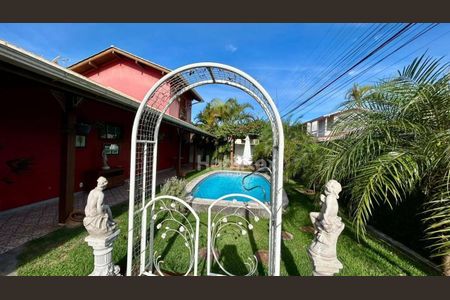 2_photo/95273b9cb9.f2ed236aecaa8a04-ATLAS-876766c7-62e6-4696-8df9-d244d2d83ea0.jpg de casa à venda com 3 quartos, 170m² em Rio Tavares, Florianópolis