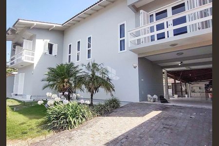 10_photo/95273b9d19.813e0fc0a92df6ab-ATLAS-21319337-e4e8-4ab7-87f7-ffb458e5c48c.jpg de casa à venda com 4 quartos, 222m² em Rio Tavares, Florianópolis