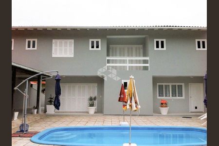 9_photo/95273b9d19.813e0fc0a92df6ab-ATLAS-c002d33d-e2de-47dc-af01-577950d8b21c.jpg de casa à venda com 4 quartos, 222m² em Rio Tavares, Florianópolis