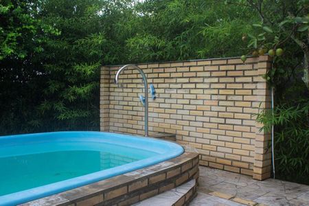 2_photo/95273b9d29.c4a86b3c211625c7-ATLAS-3457c06f-e052-4aec-b7ba-8b8519e1f1d3.jpg de casa à venda com 4 quartos, 228m² em Rio Tavares, Florianópolis