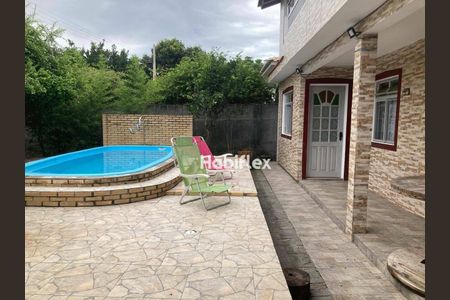 8_photo/95273b9d29.c4a86b3c211625c7-ATLAS-d6d31785-d955-44b2-a751-71f79e7bcae4.jpg de casa à venda com 3 quartos, 144m² em Rio Tavares, Florianópolis