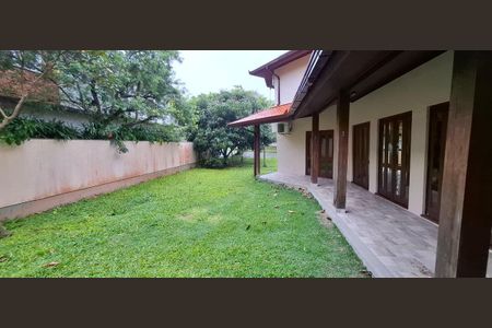 3_photo/95273c0c9f.9612d26e9df26329-ATLAS-1139d715-1ce5-4ab0-9fec-cedf8d5ede17.jpg de casa de condomínio para alugar com 4 quartos, 385m² em Rio Tavares, Florianópolis