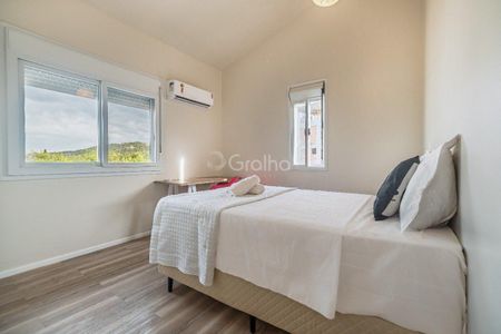 41_photo/95273e63d1.07ea2474e20ead1e-ATLAS-9679a7a5-3b9e-4cb8-90ba-9c9850d8a3cd.jpg de casa à venda com 3 quartos, 137m² em Barra da Lagoa, Florianópolis