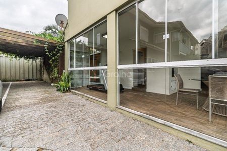 2_photo/95273e63d1.07ea2474e20ead1e-ATLAS-b9ec7c5c-c828-4df1-966f-1b4a61151f4e.jpg de casa à venda com 3 quartos, 137m² em Barra da Lagoa, Florianópolis