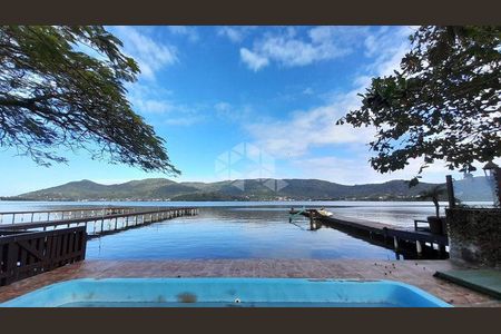 4_photo/95273ea409.7c2f99ac8ad67b81-ATLAS-ba7691cc-e2c7-41e7-9e70-dec0df19336e.jpg de kitnet/studio para alugar com 1 quarto, 30m² em Lagoa da Conceição, Florianópolis