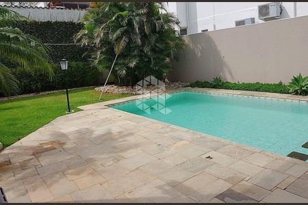 9_photo/95273eb15b.dfdf3a77207432af-ATLAS-6ceed0df-af0f-46fb-bffb-1344036f0b7e.jpg de casa à venda com 5 quartos, 340m² em Lagoa da Conceição, Florianópolis