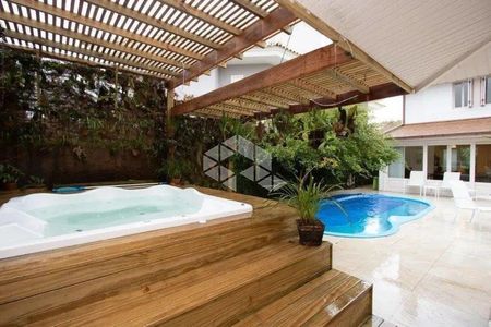 11_photo/95273eb2d7.de7f1e39899531ac-ATLAS-5c3f8a1e-9c4e-479e-8b24-4e3e0eb835fd.jpg de casa à venda com 4 quartos, 230m² em Lagoa da Conceição, Florianópolis