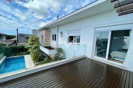 11_photo/95273eb6cd.ceff8192393c33de-ATLAS-7a8919a2-7008-4fa0-9dea-ec5499d197fc.jpg de casa à venda com 4 quartos, 569m² em Lagoa da Conceição, Florianópolis