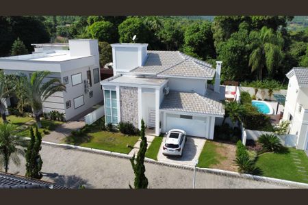 12_photo/9527415c77.ae6c0d4ae2e822c2-ATLAS-53150534-2b43-4e5b-9559-74bdd3b6c7cb.jpg de casa de condomínio à venda com 4 quartos, 226m² em Vargem Pequena, Florianópolis