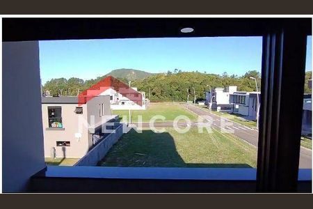 11_photo/952741d435.ac3b32f3884e407f-ATLAS-10394e28-5aad-4882-9a84-e06d5f6ee6fc.jpg de casa de condomínio à venda com 3 quartos, 240m² em São João do Rio Vermelho, Florianópolis