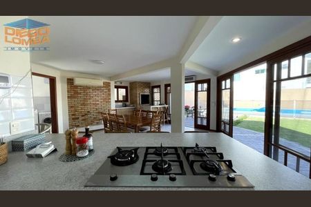 10_photo/9527425b03.df2406aa61ba3211-ATLAS-34a3a99d-ac5e-42f2-8fe0-f6bcf72e9a28.jpg de casa à venda com 4 quartos, 613m² em Ponta das Canas, Florianópolis