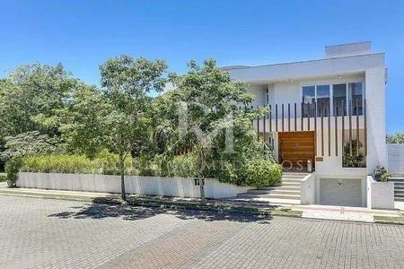 8_photo/9527445d4d.0f81dd1a9a4f6ffb-ATLAS-5b066154-19cc-43f2-b372-097a52fbcffe.jpg de casa à venda com 3 quartos, 300m² em Jurerê Internacional, Florianópolis