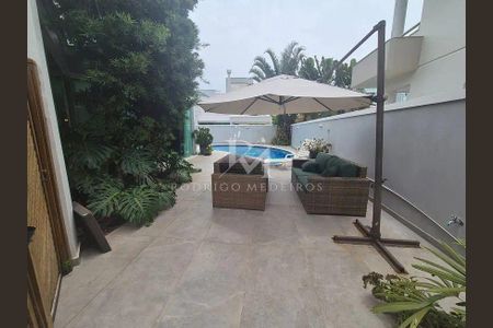 9_photo/9527445d6d.e6f02a1e96aef2b1-ATLAS-2373649c-ed2d-4cec-9830-e4749ed461cd.jpg de casa à venda com 4 quartos, 465m² em Jurerê Internacional, Florianópolis