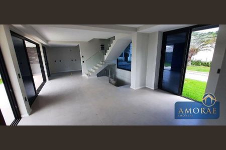 11_photo/9527447121.e02e8c580aef9d82-ATLAS-9f3c2047-e9ba-4d22-923c-ebe17a1a75bb.jpg de casa à venda com 3 quartos, 255m² em Jurerê, Florianópolis