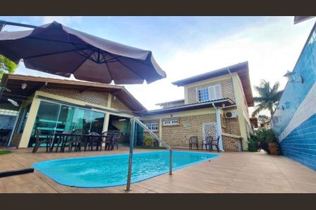 3_photo/9527447ad7.3c20d05746a6d1b7-ATLAS-2ac5642d-db2a-45d5-aafd-e7a6d8d351ae.jpg de casa à venda com 4 quartos, 345m² em Jurerê, Florianópolis