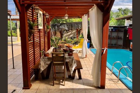 30_photo/952745a6c5.727778d524bde65a-ATLAS-0cdbbb4d-8674-4b0c-a092-4d37d22bbe4a.jpg de casa à venda com 4 quartos, 178m² em Daniela, Florianópolis