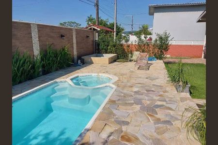 4_photo/952745a7e5.751bca41ac608a7d-ATLAS-53e47d12-c2cb-422a-bca2-1891d52bf2cb.jpg de casa à venda com 4 quartos, 201m² em Daniela, Florianópolis