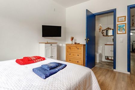 12_photo/95274677dd.ae537c11cfa6cc3a-ATLAS-6a4e10e1-727e-4f6a-98c8-7b28ec27463b.jpg de casa à venda com 3 quartos, 118m² em Sambaqui, Florianópolis