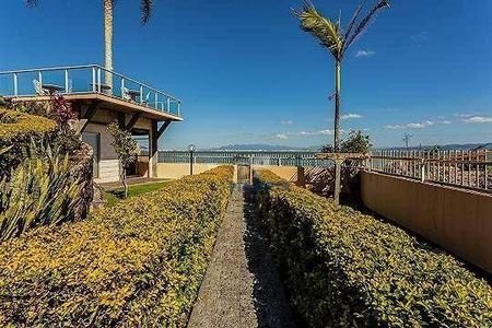 9_photo/9527467a6d.02e76da821d64bb7-ATLAS-1d2ef110-8bda-4af2-8eec-7f589e61341e.jpg de casa à venda com 3 quartos, 300m² em Sambaqui, Florianópolis