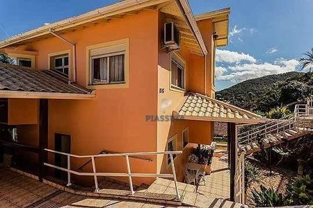 43_photo/9527467a6d.02e76da821d64bb7-ATLAS-8d74e194-8ec9-4cf3-9ed0-b2ae281198ef.jpg de casa à venda com 3 quartos, 300m² em Sambaqui, Florianópolis