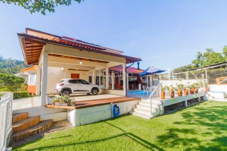 33_photo/9527467b7d.f469cfda097b0aa9-ATLAS-c84d75bb-127b-4172-802e-e41d13f5cabd.jpg de casa à venda com 4 quartos, 278m² em Sambaqui, Florianópolis