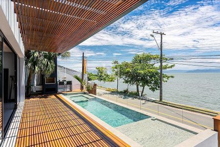 5_photo/9527470c4d.3714cccd63f8fe2d-ATLAS-cd4892e7-a06d-46cb-99f2-30f7dbe095f0.jpg de casa à venda com 5 quartos, 512m² em Cacupé, Florianópolis