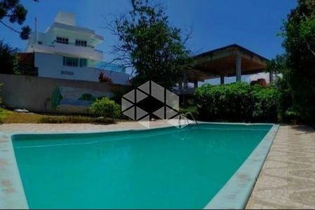 8_photo/952747a493.0f059c3d663e94cf-ATLAS-51ef7a91-1988-4048-b4e6-9e98a36ee1bb.jpg de casa à venda com 3 quartos, 300m² em Cacupé, Florianópolis