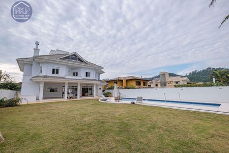 8_photo/952747a51d.adb9fcd35d178071-ATLAS-3a4d4e20-7dbb-49a1-83ec-655505053d8e.jpg de casa de condomínio à venda com 5 quartos, 511m² em Cacupé, Florianópolis