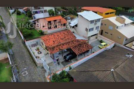 4_photo/95276a1521.07fb07773285f6be-ATLAS-c4d27cfe-b2ba-403d-9cfc-b67b9abe73e8.jpg de casa à venda com 6 quartos, 234m² em Santinho, Florianópolis