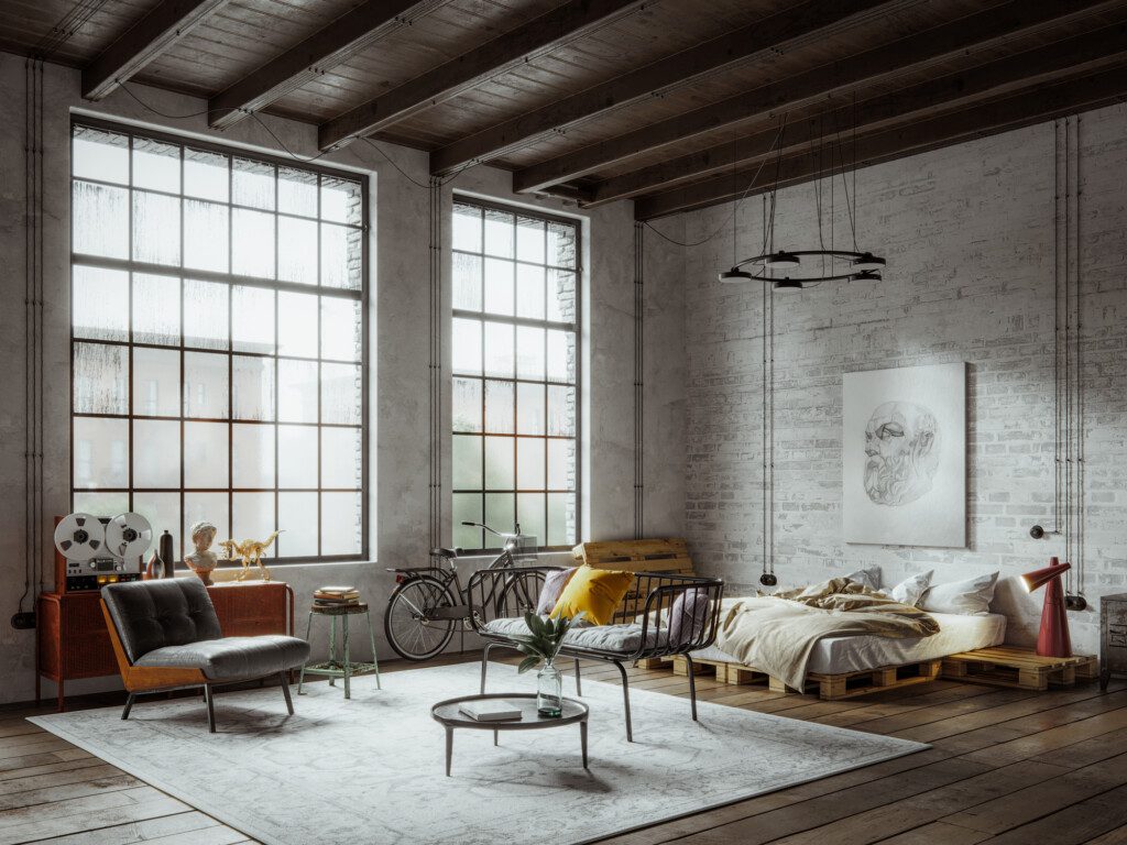 Imagem panorâmica de um loft decorado em estilo industrial 