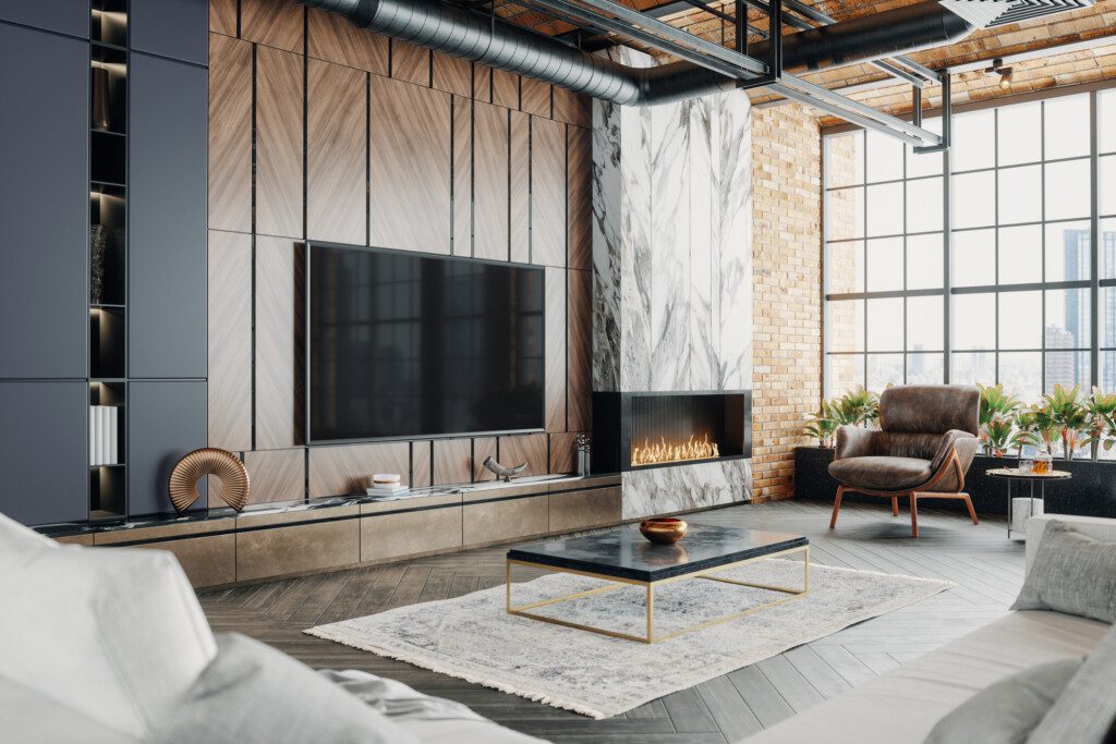 Imagem panorâmica de uma sala luxuosa com decoração industrial em tons preto, cinza e marrom