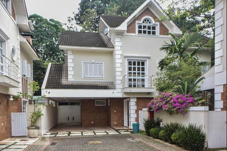 Fachada de casa de condomínio à venda com 5 quartos, 350m² em Jardim Petrópolis, São Paulo