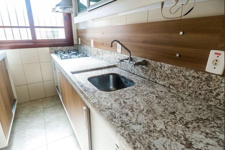 Cozinha de casa de condomínio à venda com 3 quartos, 170m² em Teresópolis, Porto Alegre