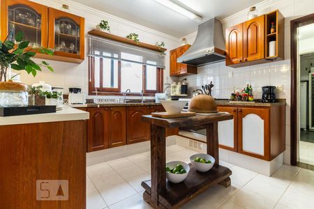 Casa de condomínio à venda com 420m², 4 quartos e 4 vagas Casa de condomínio à venda com 420m², 4 quartos e 4 vagasCozinha