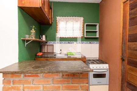 sala-cozinha de casa de condomínio para alugar com 1 quarto, 26m² em Lagoa da Conceição, Florianópolis