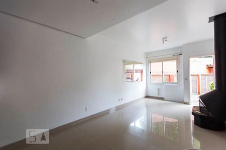 Sala de casa de condomínio à venda com 3 quartos, 140m² em Teresópolis, Porto Alegre