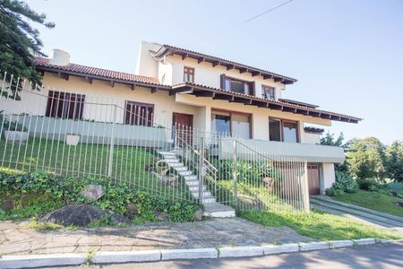 Casa de condomínio à venda com 450m², 5 quartos e 2 vagas Casa de condomínio à venda com 450m², 5 quartos e 2 vagasFachada