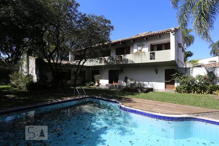Casa à venda com 560m², 5 quartos e 6 vagas Casa à venda com 560m², 5 quartos e 6 vagasFachada da casa