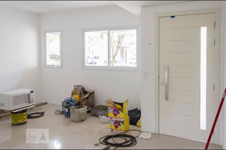 Sala de casa de condomínio à venda com 3 quartos, 150m² em Marechal Rondon, Canoas