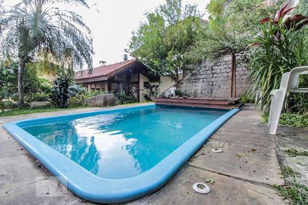 Piscina de casa à venda com 3 quartos, 300m² em Boa Vista, Porto Alegre