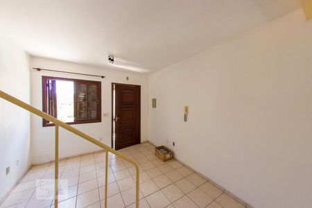Sala de casa de condomínio à venda com 2 quartos, 60m² em Vila Nova, Porto Alegre