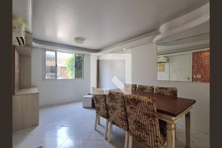 Sala de casa de condomínio à venda com 4 quartos, 108m² em Humaitá, Porto Alegre