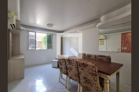 Sala de casa de condomínio à venda com 4 quartos, 108m² em Humaitá, Porto Alegre