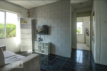 Sala de apartamento à venda com 1 quarto, 43m² em Vila Nova, Porto Alegre