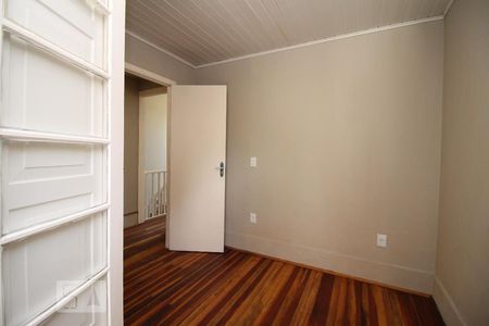 Dormitorio 1  de casa à venda com 2 quartos, 200m² em Rio Branco, Porto Alegre